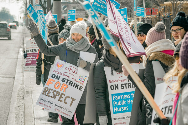 Windsor-Essex County Health Unit nurses on the picket line the first day of their strike for an equitable collective agreement that recognizes the critical work they do to protect the public's safety everyday—and doesn't widen the pay gap between men and women. March 8, 2019 Photo credit: Gregory Bennett/ONA (CNW Group/Ontario Nurses' Association)
