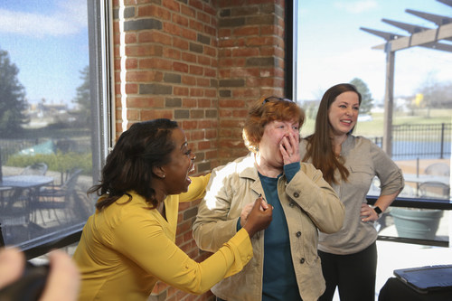 Beverly Fulkerson, middle, from Osgood, Indiana was surprised by HGTV's Tiffany Brooks with the news that she is the winner of the HGTV Dream Home Giveaway 2019, located in Whitefish, Montana.