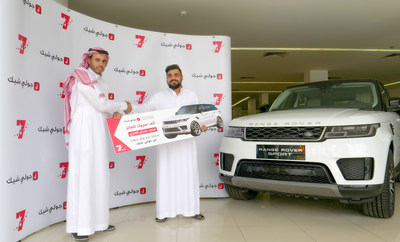 Representing Jollychic, on the left, Mr. Abdullah Al-Faify with the winner, on the right, Mr. Mohammed AlOnezi