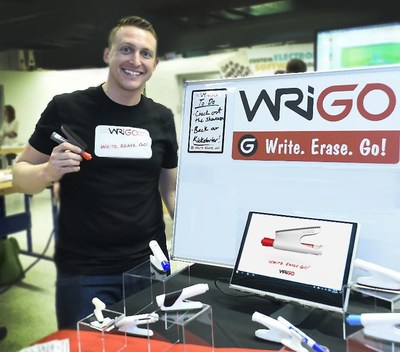 Founder, John Kaiser, with WRIGO on display for the Kickstarter campaign launch at mHUB's second anniversary Product Showcase and Demo Day 2019.