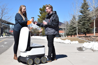 Northern Arizona University students enjoy coffee delivered via robot from Einstein Bros. Bagels.
