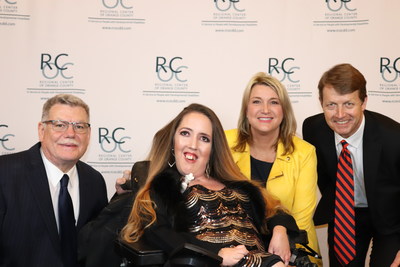 L-R: RCOC Executive Director Larry Landauer, Self-Advocate Spotlight Award honoree Jennifer Bright, KCAL9/KCBS2's Michele Gile, RCOC Board Chair Alan Martin.