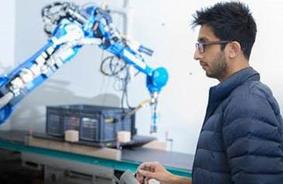 Plus One Robotics engineer testing the company's AI technology.