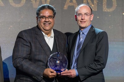 Murthy Renduchintala, chief engineering officer and group president of the Technology, Systems Architecture & Client Group at Intel (left) with Brian Trafas, executive vice president of KLA's Global Customer Organization (right). Photographer: Chip Holley Productions.
