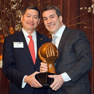 Thomas A. Greco (right), of Hilco Global,  receives the National Jewish Health Humanitarian Award from Doug Jung at the 2019 Financial Industries Dinner in New York, which raised nearly $720,000 for National Jewish Health, the nation's leading respiratory hospital.