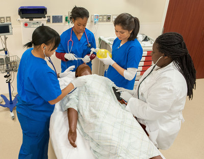 Learners work together as a team to perform clinical tasks on SimMan® 3G.