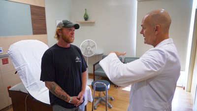 Okyanos orthopedic and stem cell therapy specialist Dr. Michael Price consults with Afghanistan Special Forces veteran Ike Atlas.