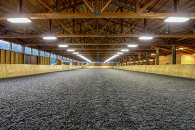 Developed to accommodate the owners' equestrian pursuits, the property features an impressive horse training facility with an indoor riding arena measuring 70-ft by 204-ft. The arena uses Attwood composite footing, an extremely low maintenance footing that is often used in the Olympic games. WashingtonLuxuryAuction.com.