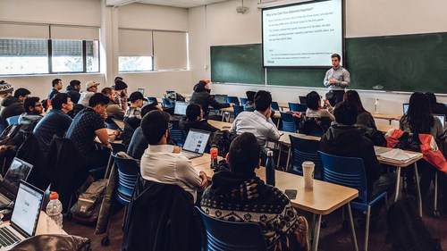 Dylan Kiselbach, Riivos Solutions Architect, leading a mine valuation and financial statements workshop for UBC mining students