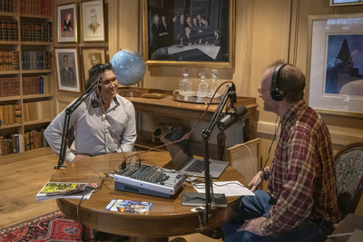 Veteran journalist David McGuffin, host of the Explore podcast, interviews Inuit athlete and actor Johnny Issaluk. (CNW Group/Royal Canadian Geographical Society)