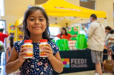 Feed the Children and Nature Made providing food and essentials to families at a community distribution event in Los Angeles.