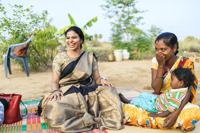 Anu George Canjanathoppil, incoming Executive Director for International Justice Mission Canada, with a survivor of forced labour slavery. (CNW Group/International Justice Mission Canada)