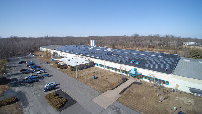 1,566 high efficiency solar panels were installed on the roof of the 140,000 sq. ft. manufacturing plant