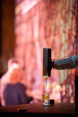 Robotic arm printing the Bulleit 3D Printed Beta Test Cocktail.