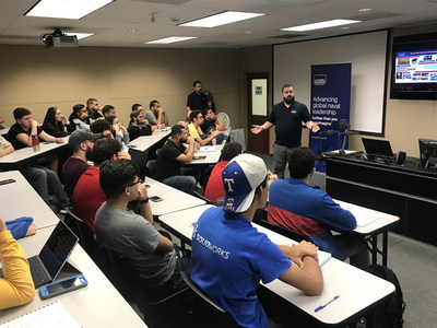 San Juan, Puerto Rico — Dr. Freddie Santiago, from the U.S. Naval Research Laboratory’s remote sensing division presents his cutting-edge research and shares professional development experiences with engineering students from Polytechnic University of Puerto Rico, during Navy Week Puerto Rico – a Navy Community Outreach event designed to engage areas of the country without a significant Navy presence. (Photo by: U.S. Naval Research Laboratory) San Juan, Puerto Rico — Dr. Freddie Santiago, from the U.S. Naval Research Laboratory’s remote sensing division presents his cutting-edge research and shares professional development experiences with engineering students from Polytechnic University of Puerto Rico, during Navy Week Puerto Rico – a Navy Community Outreach event designed to engage areas of the country without a significant Navy presence. (Photo by: U.S. Naval Research Laboratory)