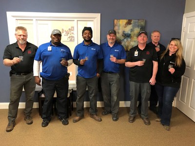 Captain Jose L. Rodriguez, Joint Base Anacostia-Bolling Commanding Officer at Bolling Family Housing, coined the following members of the Hunt Military Communities team (L-R): Patrick Carter – Warehouse Supervisor, Barksdale, Dennis Cox – Maintenance Tech, Maxwell, Jeff Mueller – Director of Safety, HMC, Greg Smith – Maintenance Director, Barksdale, Mat Swanson – Maintenance Tech, Great Lakes, Jamie Williams – Maintenance Director, Langley, Mandy Zahn – Ops Support Manager, Maintenance, HMC Captain Jose L. Rodriguez, Joint Base Anacostia-Bolling Commanding Officer at Bolling Family Housing, coined the following members of the Hunt Military Communities team (L-R): Patrick Carter – Warehouse Supervisor, Barksdale, Dennis Cox – Maintenance Tech, Maxwell, Jeff Mueller – Director of Safety, HMC, Greg Smith – Maintenance Director, Barksdale, Mat Swanson – Maintenance Tech, Great Lakes, Jamie Williams – Maintenance Director, Langley, Mandy Zahn – Ops Support Manager, Maintenance, HMC