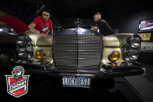 Ziebart of Jamestown owner, Kyle Crandall (right), and his associate, Jesus Robles (left), worked to restore the exterior of Lucille Ball’s 1972 Mercedes-Benz 280 SE.
