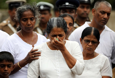 A Sri Lankan women mourns.