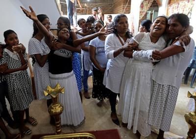 Women of Sri Lanka mourn the loss of loved ones.