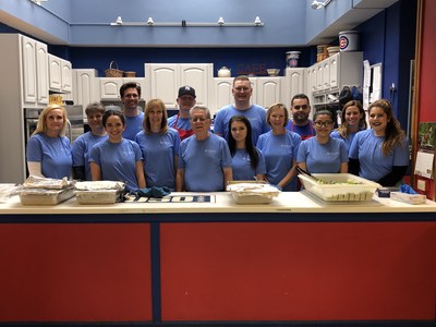 Combined Insurance employees volunteering at the USO of Illinois Great Lakes Center.