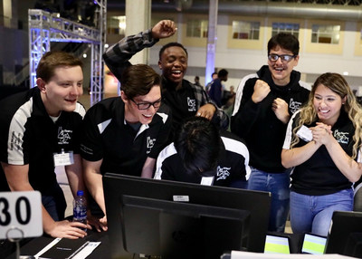 During the 7th annual Magnetar Team Challenge, high school teams built $100,000 mock stock portfolios and managed them through two hour-long trading periods. Here, the Chicago High School for Agricultural Sciences team - who placed second - celebrates after receiving a profit and loss update.