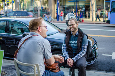 Fletcher Dennison, COO of SimplePractice, volunteers as a listener during a previous Sidewalk Talk event in Santa Monica, CA