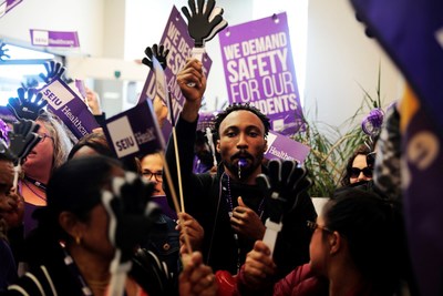 300 frontline healthcare workers rallying inside of Extendicare's head office in Markham, Ontario (CNW Group/SEIU Healthcare)