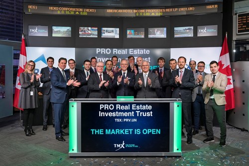 James W. Beckerleg, PROREIT President and CEO, and Gordon G. Lawlor, PROREIT Executive VP, CFO and Secretary, open the market with their guests and TSX members. (CNW Group/Pro Real Estate Investment Trust)