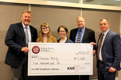 Josh Angelotta, senior partner of Kisling, Nestico & Redick, awards student Elianna Norin with the $5,000 KNR Don’t Text and Drive Scholarship.