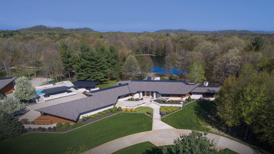 An architecturally relevant oasis set amongst a serene, forested backdrop awaits; this incomparable, modern home offers every indulgence, including a collector’s dream garage. Don't miss this Absolute Auction with bidding beginning June 11th!