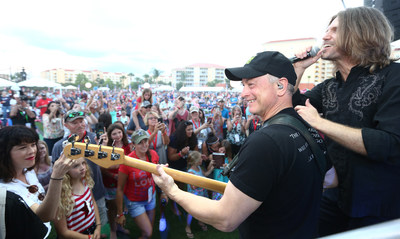 Gary Sinise & The Lt. Dan Band entertain an audience of military veterans and their families during Westgate Resorts' Military Weekend in Orlando.