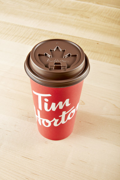 The new Tim Hortons lids have been completely redesigned in both function and design with a raised dome, tabbed closure, an improved flow of coffee and an embossed maple leaf. (CNW Group/Tim Hortons)