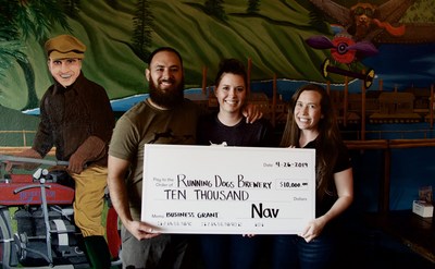 Maggie and Jaron Clayton, owners of Running Dogs Brewery, accept $10,000 Grant from Nav's PR Manager, Amanda Triest.