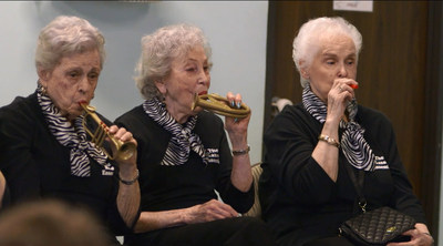 Naomi Friedman and fellow members of the Kazoo Ensemble performing at a local day care facility.