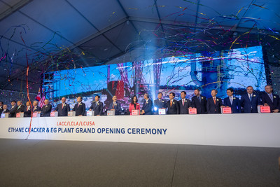 Government and company representative complete the grand opening celebration ceremony.