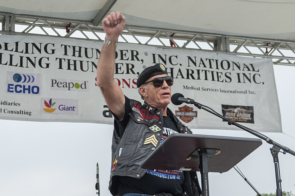 Sgt. Artie Muller speaking to the crowd at the Reflecting Pool stage during Rolling Thunder XXX - photograph by Lee Stalsworth