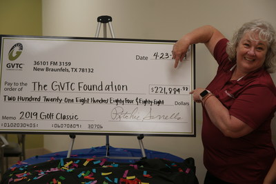 Foundation Treasurer, Jeanie Hake, With Fundraiser Check