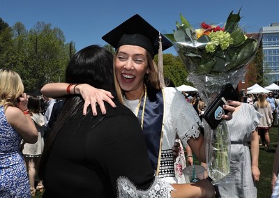 Students and families celebrate at the Commencement ceremony at Bentley University in Waltham, Mass., on May 18, 2019.