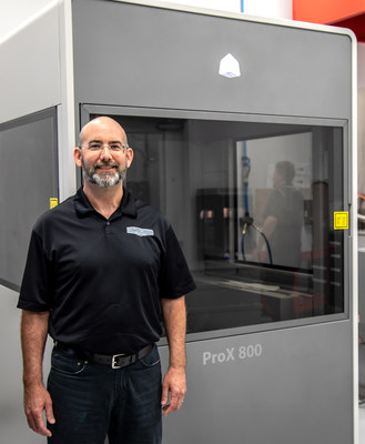 Reneau Van Landingham (pictured) and the team at Stewart-Haas Racing use 3D Systems’ ProX 800 to produce aerodynamic components for race car component development and wind tunnel testing. (Image courtesy of Stewart-Haas Racing)