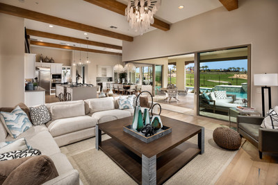 The Dorado features an open layout with floor-to-ceiling rolling glass doors overlooking the backyard at Trilogy at Verde River.