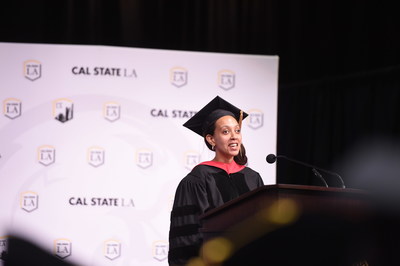 Disability rights advocate Haben Girma addresses graduates in the Charter College of Education at Cal State LA. (Credit: Robert Huskey/Cal State LA)
