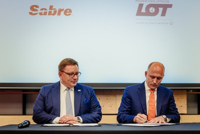 Rafał Milczarski (left), CEO of Polish carrier LOT, and Sean Menke, president and CEO of Sabre, met in a signing ceremony in Poland announcing the companies' new partnership.