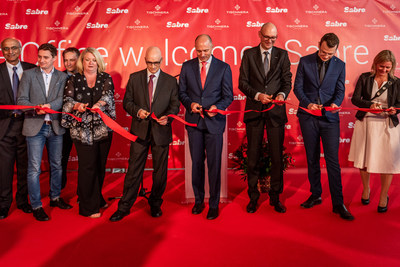 Key Sabre executives were present for a ribbon-cutting ceremony at the site that will house Sabre Poland's new global development center location. Among those pictured are Sundar Narasimhan, SVP and president of Sabre Labs and product strategy (far left); Louis Selincourt, SVP, global development centers (fifth from left); Sean Menke, president and CEO (fourth from right); and Sebastian Drzewieckit, vice president and managing director of the Poland development center (third from right). Key Sabre executives were present for a ribbon-cutting ceremony at the site that will house Sabre Poland's new global development center location. Among those pictured are Sundar Narasimhan, SVP and president of Sabre Labs and product strategy (far left); Louis Selincourt, SVP, global development centers (fifth from left); Sean Menke, president and CEO (fourth from right); and Sebastian Drzewieckit, vice president and managing director of the Poland development center (third from right).