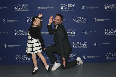 Audrey Lorenz shows Nick Kroll how to pose for photos at Memorial Sloan Ketterings Comedy vs Cancer event on Tuesday, May 14, 2019 in New York City. Lorenz, an 8-year-old cancer survivor, opened the show with her comedy routine before introducing Kroll to the audience.