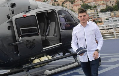 Rising star of the Aston Martin Red Bull Racing Team Max Verstappen kicks off the Monaco Grand Prix weekend by delivering the first of five new Monaco collector timepieces, 1969-1979 Limited Edition by helicopter to celebrate the 50th anniversary of the iconic watch. 