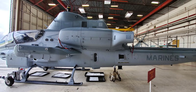 Marine Corps AH-1Z Viper helicopter is painted with one-component (1K) camouflage gray polysiloxane topcoat on the exterior. U.S. Naval Research Laboratory chemists developed the new topcoat for DoD aircraft, which is safer for the environment and easier to apply.
(U.S. Naval Research Laboratory)