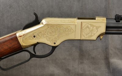 The engraving design is inspired by a historic Henry rifle in the Cody Firearms Museum collection.