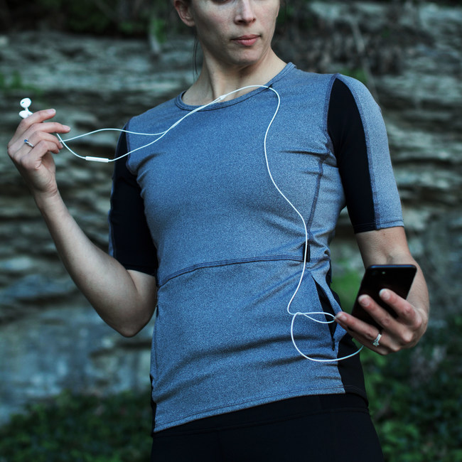 The Berryman Running top is unlike any other. Based around women ultra-marathoners who wanted the best shirt every made to help excel at long distances. This shirt features technical details such as compression arm sleeves for your phone, a loop for your headphones, and four storage pockets for your stuff.