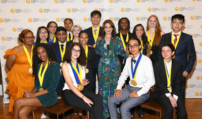 Emmy and Golden Globe Award-winning actress, writer and producer Tina Fey is pictured with Gold Medal Portfolio recipients backstage at the National Ceremony for the 2019 Scholastic Art & Writing Awards held at Carnegie Hall in New York, Thursday June 6, 2019.  (Stuart Ramson/AP Images for Alliance for Young Artists & Writers)