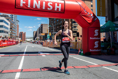 Clara Lownie of London, Ontario wins the Scotiabank Blue Nose Marathon with a time of 3:24.24.  Photo Credit: Stoo Metz (Click Productions) (CNW Group/Scotiabank)